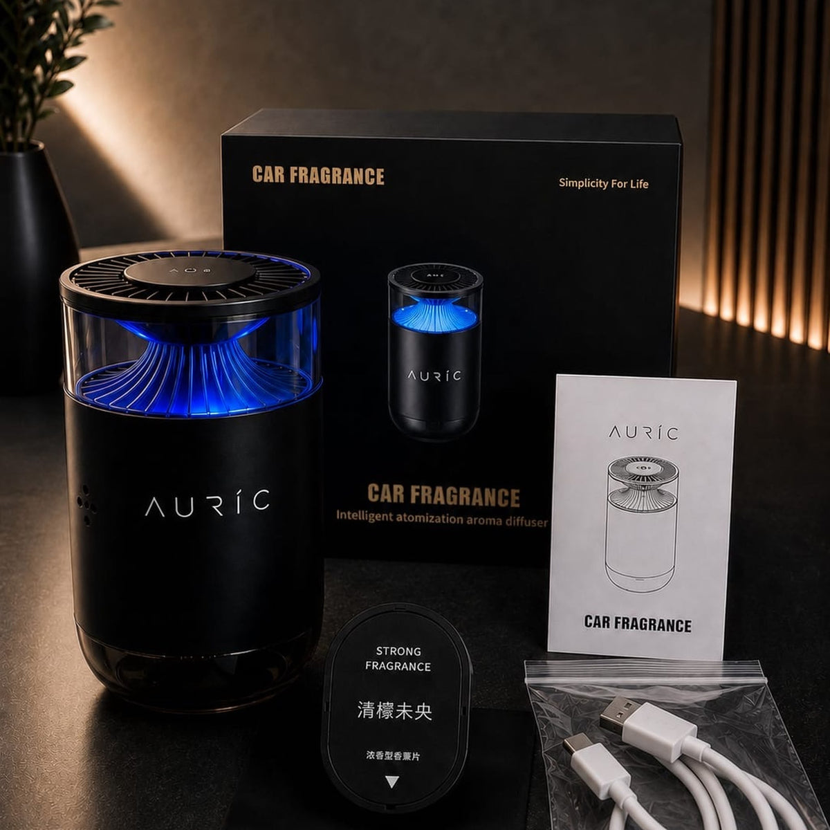 Contenido de la caja del difusor AURIC® LUXURY: difusor, cartucho de aroma, manual y cable USB